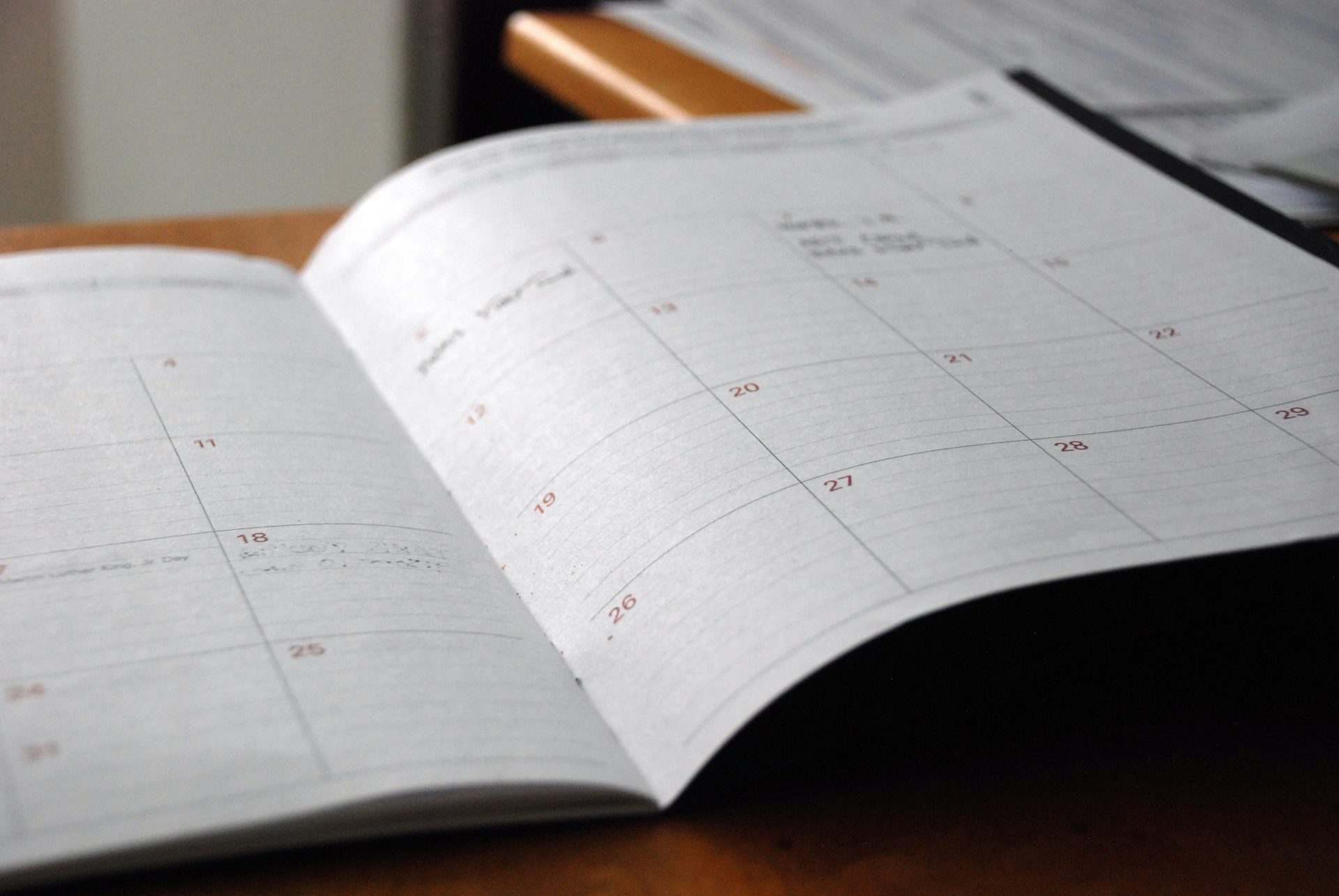 An elegant paper calendar for scheduling events.