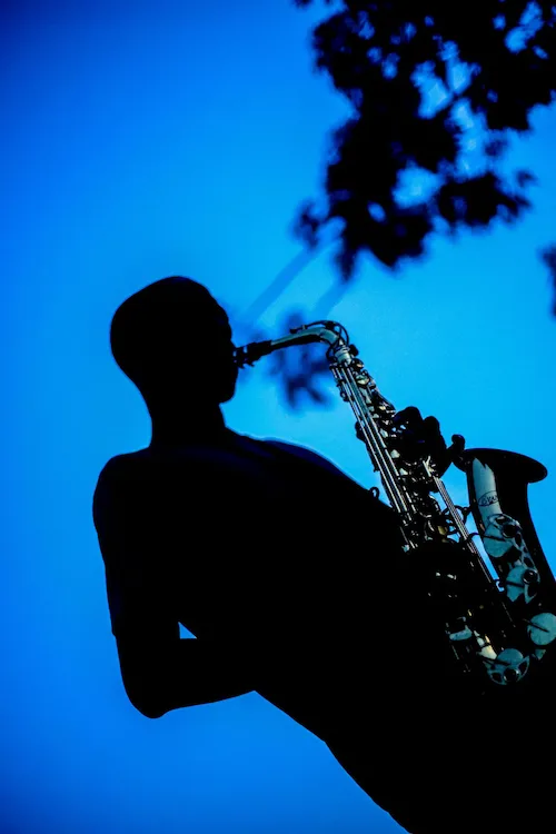 A musician playing saxophone